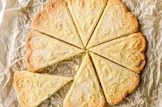 a pie cut into eight slices on top of wax paper