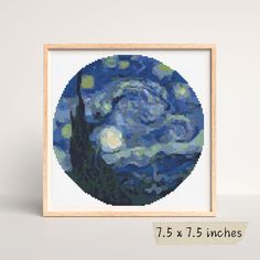 the starry night is depicted in this cross - stitch art piece, which features a blue circle with stars on it