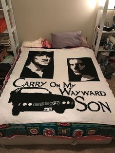 a bed with two pictures on it and the words carry on my wayward son