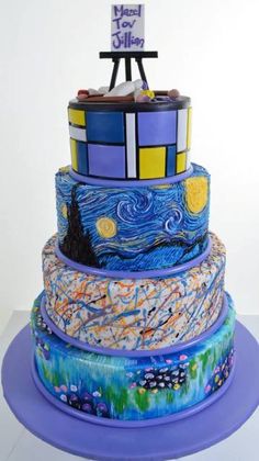 a multi - tiered cake decorated with the starry night theme