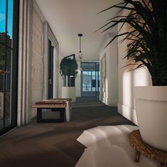 an empty hallway with potted plants on either side and a bench in the middle