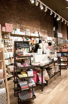 the inside of a store with lots of items on display