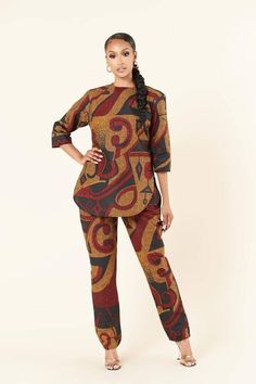 Description The Hana African print Ankara 2 piece set is 100% African wax cotton. It is made with love in Nigeria Zipper in top and rope in pants Side pockets in pants This piece set will be made in the fabrics attached. Kindly chat Us if You desire more fabric options and further questions concerning this outfit. Measurements Required -bust -waist -hips -thigh -height Care Instructions: Wash with soap Do not bleach Cotton Workwear Sets, Fitted Multicolor Cotton Pant Set, Fitted Batik Print Long Sleeve Sets, Fitted Long Sleeve Batik Print Sets, Ankara Trouser And Top, Trouser And Top, Ankara Pants, Ankara Trousers, African Print Pants