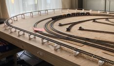 a model train set is shown on the table