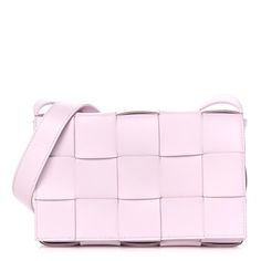 This is an authentic BOTTEGA VENETA Lambskin Maxi Intrecciato Cassette Crossbody Bag in Bliss Washed. This stylish messenger bag is crafted of tightly woven lambskin leather in pale pink. The bag features a matching adjustable crossbody strap with aged silver hardware and a front flap. The flap opens to a smooth leather interior with a zipper pocket. Designer Pink Rectangular Case Bag, Luxury Intrecciato Rectangular Shoulder Bag, Luxury Rectangular Shoulder Bag In Woven Leather, Luxury Rectangular Shoulder Bag With Woven Leather, Luxury Rectangular Woven Leather Shoulder Bag, Luxury Woven Leather Rectangular Shoulder Bag, Rectangular Intrecciato Shoulder Bag For Evenings, Rectangular Intrecciato Weave Shoulder Bag For Evening, Rectangular Intrecciato Weave Evening Shoulder Bag