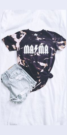 "Acid washed Mama tee! Black softstyle tshirt (For size reference, photo above is a size medium) For an oversized look, or to knot it, I suggest sizing up! -\"Unisex\" so they fit both men and women comfortably! // PLEASE KEEP IN MIND- No two shirts will come out the exact same. The design pattern will be the same, but the exact placements of the bleached areas, also the intensity of the colors, will vary shirt to shirt // Care Instructions- Wash inside out Cold water" Trendy Acid Wash T-shirt For Concert, Faded Washed Band Merch T-shirt, Trendy Faded T-shirt For Streetwear, Trendy Acid Wash T-shirt With Letter Print, Music Festival Graphic Tee T-shirt Soft-washed, Edgy Acid Wash Short Sleeve T-shirt, Acid Wash Band Merch T-shirt In Relaxed Fit, Trendy Bleached T-shirt With Relaxed Fit, Summer Distressed Band Merch T-shirt