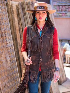 I love a great vest! This is a great finish to any western outfit. Our Whiskey Jessie Fringe vest was created with careful placement of fringe and pockets. Loaded with hand stitching, our Italian leather has and amazing attention to detail. Fun to wear, and a true Wild West Statement! Fine distressed Italian leather in camel's, taupe's and chocolate. We do stock inventory, but please allow 4 weeks, if we are in production, contact if you are in a rush. We can change arm length, but do not divert Brown Sleeveless Vest For Western-themed Events, Brown Western Vest For Western-themed Events, Western Style Brown Vest For Western-themed Events, Sleeveless Western Outerwear For Fall, Western Style Denim Vest For Fall, Fitted Vest For Western-themed Events In Fall, Brown Sleeveless Fringe Vest, Western Style Sleeveless Vest For Rodeo, Western Rodeo Vest