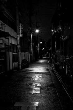 an empty street at night with no one on it