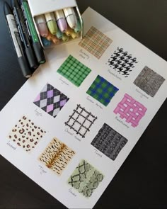 some different types of patterns on a sheet of paper next to markers and crayons