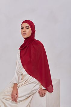 Measurements: 180 cm x 75 cm Our Georgette Crepe Hijabs are made from a luxurious georgette material with crepe texture. The unique texture of our Georgette Crepe Hijabs make these the perfect go-to for everyday or evening outfits. Pair with our Cotton Undercaps and Magnet Pins for a stay-in-place all day hijab style. Elegant Chiffon Headscarf For Eid, Traditional Hijab For Eid, Solid Color Hijab For Eid, Traditional Solid Color Khimar For Eid, Traditional Solid Khimar For Eid, Elegant Chiffon Khimar For Eid, Elegant Long Solid Hijab, Elegant Long Solid Color Hijab, Chiffon Khimar For Eid