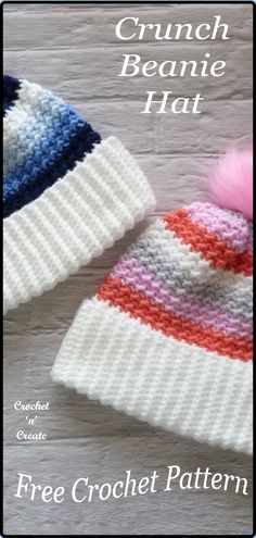 two crochet beanies with pink, blue and white stripes on them sitting next to each other