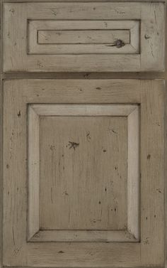 an old wooden cabinet with two doors and one drawer on the bottom, against a white background