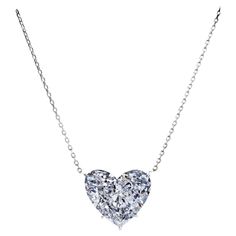 This breathtaking pendant features a GIA-certified 3.01 carat heart-cut diamond, suspended on a sleek platinum chain. With a pristine D color grade, the diamond exhibits the highest level of colorless brilliance, making it incredibly radiant. Its internally flawless clarity grade guarantees the absence of any inclusions, resulting in a truly immaculate stone. The diamond’s excellent polish and symmetry ensure maximum light reflection, enhancing its sparkle from every angle. The faint fluorescenc Heart Shaped Diamond Pendant, Platinum Necklace, Round Diamond Pendant, Platinum Chain, Romantic Necklace, Heart Shaped Pendant Necklace, Family Jewellery, Antique Pendant, White Gold Diamond Rings