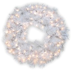 a white christmas wreath with lights on it