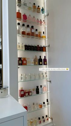 the shelves are filled with different types of perfumes