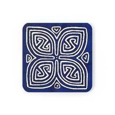 a blue and white square coaster with an intricate design on the front, featuring two intersecting circles