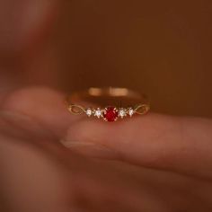 Dainty Ruby Gold Ring, July Birthstone Rings, Ruby Diamond Ring, Red Ruby Stacking Ring, Genuine Ruby Rings, Graduation Ring, Casual Rings We use the highest quality moissanite! Moissanite: ✦ Color: D Colorless ✦ Clarity: VVS1 OR All our diamonds are 100% natural. We use only conflict-free diamonds and gemstones. Diamond: ✦ Color: F-G ✦ Clarity: SI1-VS ✦PRODUCT DETAILS✦ → center stone: natural ruby → accent stone: diamonds Also available in other colored gemstones upon request. Please get in tou Red Open Diamond Promise Ring, Fine Jewelry Ruby Diamond Ring Gift, Ruby Diamond Ring For Gifts In Fine Jewelry Style, Elegant Red Crystal Round Ring, Elegant Red Round Crystal Ring, Red Ruby Open Diamond Ring, Red 14k Gold Birthstone Ring For Promise, Elegant Red Promise Ring, Red Ruby Cluster Ring With Round Cut