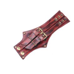 Stylish Steampunk leather bracelet Upgrade your accessory game with our Steampunk leather bracelet. Crafted with premium leather, this bracelet combines vintage charm with contemporary style. The rich brown tones and distressed finish give it a rugged and worn look, perfect for adding an edgy touch to your Steampunk ensemble. Versatile and eye-catching, our Steampunk leather bracelet is perfect for both casual and formal occasions. Whether you're attending a Steampunk event, cosplay gathering, o Vintage Leather Wristband Bracelet, Vintage Leather Bracelet Wristband, Brown Leather Bracelet Fashion Accessory, Gothic Leather Bracelet With Rivets, Brown Punk Leather Bracelet For Gift, Adjustable Brown Punk Bracelets, Vintage Brown Cuff Bracelet With Wrist Strap, Punk Style Leather Strap Bracelets, Punk Leather Strap Bracelets