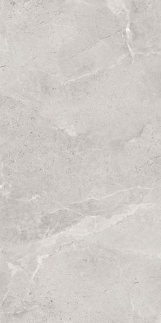 a white marble textured surface with grey streaks