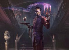 a man holding a tray with a candle in his hand while wearing a purple outfit