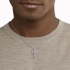 A precious interpretation of a classic motif, our medium cross pendant in white gold is available in a variety of different carat weights, seen here with 0.15 carat diamonds. Deftly suspended from a white gold chain, each diamond is embraced by a minimal metal setting, optimising their brilliance and presence. The Classic Graff collection celebrates the purity and fire of the finest Graff diamonds showcased in truly timeless jewels and eternally elegant silhouettes. A precious interpretation of White Gold Cross Necklace With Brilliant Cut Cubic Zirconia, Luxury White Gold Cross Necklace With Diamond Accents, White Gold Cross Necklace With Diamond Cut Cubic Zirconia, White Gold Cubic Zirconia Cross Necklace With Diamond Cut, White Gold Cross Necklace With Cubic Zirconia, White Gold Brilliant Cut Diamond Cross Necklace, Brilliant Cut Sterling Silver Cross Necklace In White Gold, White Gold Sterling Silver Cross Necklace With Brilliant Cut, White Gold Diamond Cross Pendant Necklace