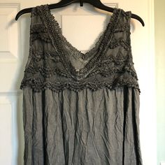 New, Never Worn Dark Gray Tank Top. Purchased Summer Of 2021 In A Small Boutique. Flowy, Loose, Very Soft Material. Spring Embellished V-neck Tank Top, Gray Bohemian Sleeveless Top, Gray Sleeveless Bohemian Top, Gray Tank Top, Small Boutique, Grey Tank Top, Dark Wear, Gray Tank, Soft Material