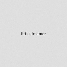 the words little dreamer are black and white