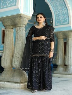 Classic festival wear in soft colors Mirror embellished embroidery on kurta and garara of 5.5 mtr Straight Kurta with lining. Full ghera Garara of 5mtr with lining. Dupatta in organza finished with silver border. Color: Black Fabric: Top and Sharara - Georgette Dupatta - Organza Note: Length and sizes can be customised Length - Kurta 30-32 inches Pants 40-42 inches Available in other colors If you happen to see some deformity in hand-work or fabric, that’s mere the technique of the same and not Black Garara, Black Gharara, Garara Suit, Embellished Embroidery, Georgette Sharara, Gharara Suits, Silver Lace, Sharara Set, Organza Dupatta