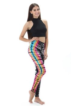 Yoga Legging Rainbow Zebra Pattern Tie Dye, Psychedelic leggings, Boho leggings. Tie dye cosmic leggings that are handmade and crafted by artisans. These are extremely lightweight and have a nice combination of spandex and Viscose. A high waist pair of leggings that offer maximum mobility and flexibility.  The best yoga leggings around, they have an extremely smooth feel with intricate multi-colored Zebra design. We use only all natural, environmentally friendly dyes as we believe in sustainable business practices. Tie Dye leggings in a Rainbow color pattern, perfect for yoga, pilates, workout, traveling or just lounging.  A high rise legging with good core compression. Perfect for music festivals, lounging around or casual wear. Cotton rayon Spandex leggings. Multicolor Stretch Yoga Pants For Festivals, Stretch Tie Dye Yoga Pants, Multicolor Fitted Leggings For Festival, Fitted Tie Dye Yoga Pants, Fitted Tie-dye Yoga Pants, Summer Festival Leggings, Summer Festival Stretch Leggings, Fitted Tie Dye Leggings For Yoga, Tie Dye Stretch Yoga Pants