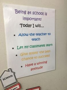 a bulletin board with writing on it and magnets attached to the back of it