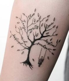 a tree tattoo with writing on it and a person hanging from the branch holding an umbrella