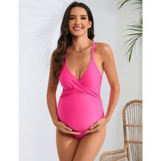 Elevate your maternity swimwear with these Women's Maternity Swimsuits. The wrap front design and adjustable crossback straps offer both style and support, making them ideal for pregnant women. The belly support feature ensures comfort and confidence, while the one-piece construction provides coverage and convenience. Perfect for summer beach outings, these swimsuits are a must-have for expecting mothers. Crafted from 85% Polyester and 15% Spandex, these swimsuits offer a comfortable stretch and Fitted Maternity Swimwear For Summer, Maternity Swimsuits, Pregnancy Swimsuit, Fitted Sleeveless Maternity Swimwear, Summer Beach Outfits, Pregnant Bathing Suit Bikinis, Maternity One Piece Swimsuit, Pink 4-way Stretch Swimwear For Beach, Maternity One Piece