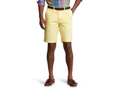 Polo Ralph Lauren 10 Relaxed Fit Twill Shorts - Men's Shorts : Yellow : Hit the street in style by wearing the Polo Ralph Lauren 10 Relaxed Fit Twill Shorts. Relaxed fit. Belt loops on the waistband. Zip-fly and button closure. Two hand pockets. Coin pocket on the right leg. Two button-through welt back pockets. Brand logo above the back right pocket. 100% cotton. Machine washable. Imported. Casual Knee-length Spring Bottoms, Casual Fitted Flat Front Bottoms, Casual Relaxed Fit Bermuda Shorts With Belt Loops, Fitted Bermuda Shorts For Casual Wear, Fitted Bermuda Shorts Casual Style, Casual Fitted Short Leg Pants, Spring Bermuda Shorts With Welt Pockets, Relaxed Fit Flat Front Bottoms For Summer, Summer Relaxed Fit Flat Front Bottoms