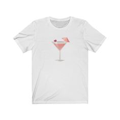 Cosmopolitan cocktail lovers t-shirt with cool graphic art print. Pink cocktail lovers t-shirt with cool graphic art print. 100% soft, lightweight cotton crewneck tee. Cosmo Cocktail lover shirt is available in sizes XS - 2XL (see photos for size chart). Available in many pretty colors! Custom printed, made to order. 100% Soft cotton Lightweight fabric Tear away label Runs true to size (retail fit, unisex sizing, please see photo of size chart) Drink Costume, Cocktail Tshirt, Cocktail Graphic, Cosmopolitan Drink, Cosmo Cocktail, Cosmopolitan Cocktail, White Bathroom Decor, Pink Cocktails, Tshirt For Women