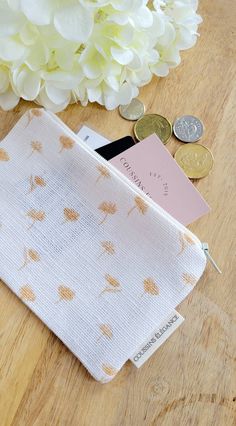 -Here is a really cute minimalist  coin purse ! Unique and practical ! Easy to fit in your purse for your cards and change.  Are you still looking for your keys in the bottom of your purse/bag? Not anymore! This cute mini pouch will be easy to find. About your little things ( EARBUD, earring, rings etc...these mini zipper pouch will take care of them. What use will you make of it ?  You can have the pleasure to offer a small gift without breaking the bank ;)  . Fabric: linen . No lining . Zipper . Dimensions : 6x4 inch ( 15.5 x 10.5 cm ) . Unique gift . Practical gift Final sale Thanks for shopping at Coussins Elegance Tampax Pearl, Mini Zipper Pouch, Large Makeup Bag, Mini Pouch, Women Wallet, Pen Pouch, Gift For Sister, Mini Pouches, Stocking Filler