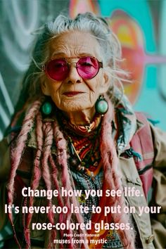 an old woman with pink glasses and dreadlocks