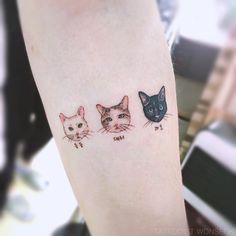 three cats tattoo on the left leg