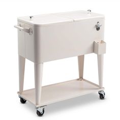 a white cooler sitting on top of a cart