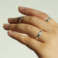 Our chunkiest stacking ring takes dainty and gives it a gentle punch in the face. (Gently!) Easy to wear and looks great on everyone! Also available in solid 14k yellow or rose gold, and in first knuckle (aka midi ring) sizes. Engraving available! All numbers, capital letters as well an ampersand (&) available, no other characters or punctuation. Engraving only available on outside of band. We are not able to offer custom fonts or characters. Modern Adjustable Ring With Smooth Bezel, Adjustable 14k Gold Midi Rings With Polished Finish, Simple Open Band Stackable Jewelry, Adjustable Thick Band Stackable Rings, Simple Stackable Open Band Jewelry, Classic Everyday Stackable Rings With Smooth Bezel, Everyday Classic Stackable Rings With Smooth Bezel, Minimalist Thick Band Stackable Jewelry, Minimalist Stackable Jewelry With Thick Band