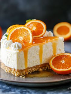 an orange cheesecake on a plate with sliced oranges