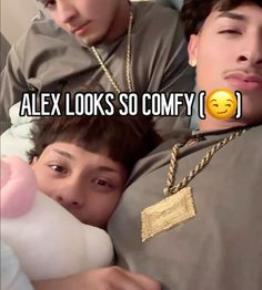 two people laying in bed with the caption alex looks so comfy