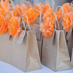 small brown bags with orange flowers on them