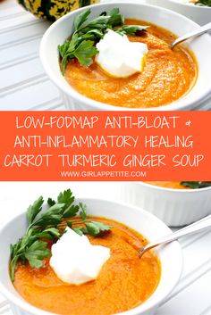 two white bowls filled with carrot soup and topped with sour cream, parsley on top