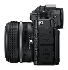 the front view of a digital camera with its lens attached to it's body