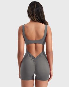 Cutout back Deep V and flattering ruching design Buttery soft, double-sided brushed fabric Removable cup pads Inside length 4.5 inches Model is wearing a size S Fabric: 75% Nylon + 25% Spandex﻿ This V-waist jumpsuit offers a blend of style and comfort, featuring a striking design that's sure to turn heads. Crafted from buttery double-sided brushed fabric, it boasts a supremely soft feel against the skin, while its all-way stretch ensures optimal comfort. The deep V-cut at the hips, coupled with Solid Ruched Activewear For Yoga, Fitted Ruched Activewear For Gym, Backless Stretch Activewear, Stretch Activewear With Ruched Back For Workout, Athleisure Activewear With Stretch And Solid Back, Athleisure Activewear With Solid Back And Stretch, Solid Back Stretch Activewear, Sporty Stretch Activewear, Workout Activewear With Ruched Back And Stretch