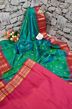 A pure enigmatic collection in golden color with the golden buti and silver zari border, with peacock motif on the pallu and meenakari butta work on spread across the saree in plaintive for, done in the traditional handloom style makes it a classic choice of many. Color: A shade of dual tone blue and green color Technique: Amazing work of golden zari buti work on the body with traditional weaving Fabric: Paithani Quality: Indyvogue's Assurance of Pure Silk Mark Certified Saree Weaving Fabric, How To Wash Silk, Peacock Motif, Paithani Saree, Blouse Measurement, Color Techniques, Traditional Weaving, Zari Work, Designer Blouse