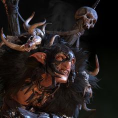 a man with horns and skulls on his head in front of an alien like creature