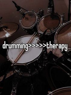 drums with the words drumming > > > > therapy