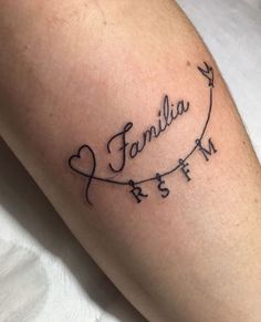 a tattoo with the word family on it