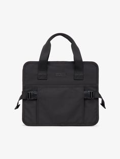 a black laptop bag with straps on the front and shoulder strap, one side open